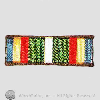 Military decoration : Coast Guard Unit Commendation Ribbon.