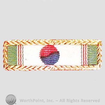 Military decoration : Korean Presidential Unit Citation Emblem.