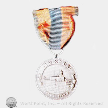 Military decoration : Navy and Marine Corps Mexican Service Medal.