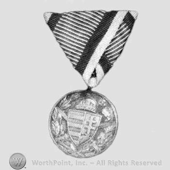 Order, medal or decoration .
