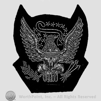 Insignia consisted of a standard eagle coat of arms; branch and arrows in it's claws.