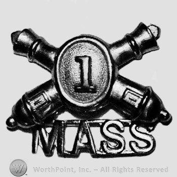 Insignia consisted of crossed cannons and number 1 in the centre; letters MASS below.