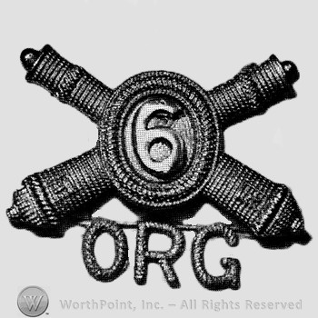 Insignia consisted of crossed cannons and number  in the centre; letters ORG below.