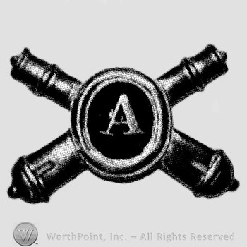 Insignia consisted of crossed cannons and letter A in the centre.