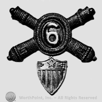 Insignia consisted of crossed cannons and number 6 at the intersection; shield with star  below.