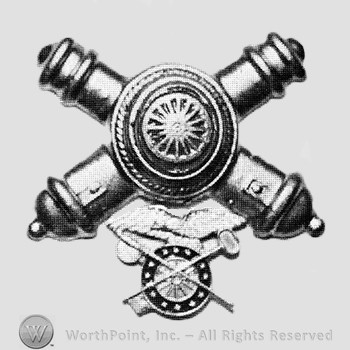 Insignia consisted of crossed cannons with a plate at the intersection; compass below.