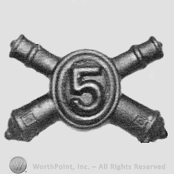 Insignia consisted of crossed cannons with a plate at the intersection; number 5 on the plate.