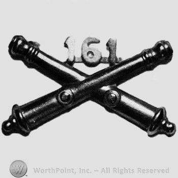 Insignia consisted of crossed cannons and number 161 above.