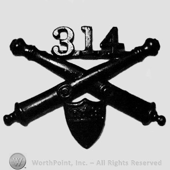 Insignia consisted of crossed cannons and number 314 above; shield below.