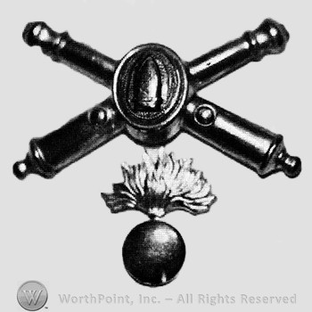 Insignia consisted of crossed cannons with a bullet at the intersection; shell and flame below.