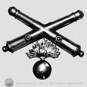 Insignia consisted of crossed cannons and shell and flame below.