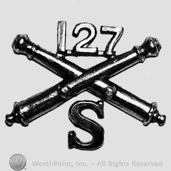 Insignia consisted of crossed cannons and number 127 above; letter S below.