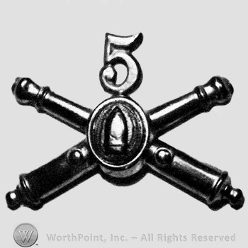 Insignia consisted of crossed cannons with a bullet at the intersection; number 5 above.