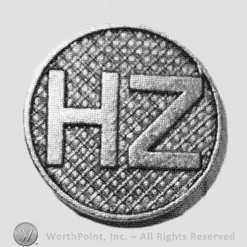 Letters HZ on a disc.