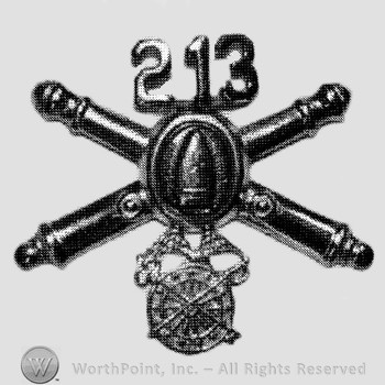 Insignia consisted of crossed cannons with bullet at the intersection and number 213 above; wheel below.