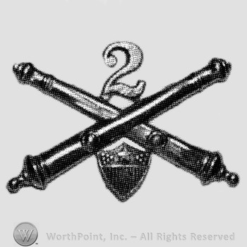 Insignia consisted of crossed cannons, number 2 above and a shield below.