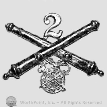Insignia consisted of crossed cannons, number 2 above and a wheel below.