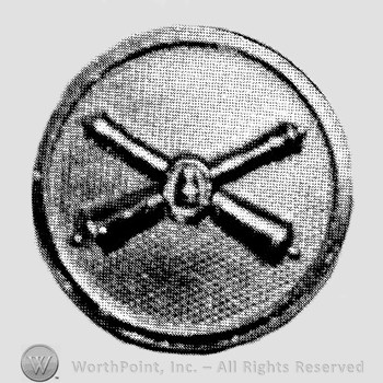 Insignia consisted of crossed cannons with a bullet at the intersection; all on a plate.