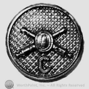 Insignia consisted of crossed cannons with a bullet at the intersection and letter C below; all on a plate.