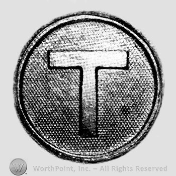 Letter T on a disc.