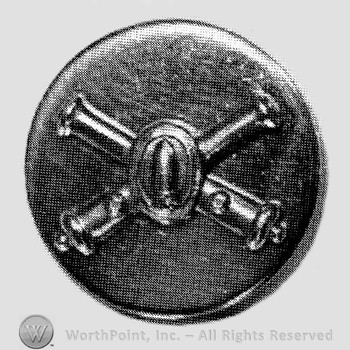 Insignia consisted of crossed cannons with a bullet at the intersection; all on a plate.