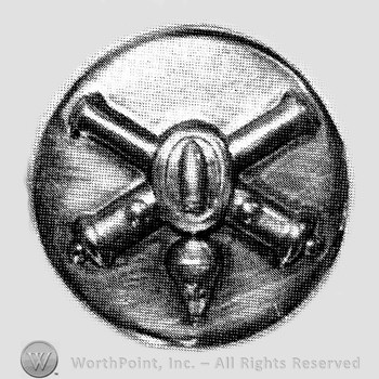 Insignia consisted of crossed cannons with a bullet at the intersection; all on a plate.