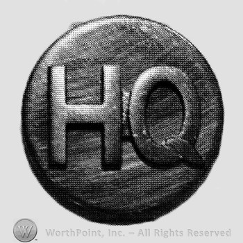 Insignia consisted of letters HQ on a plate.