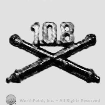 Insignia consisted of crossed cannon and number 108 above.