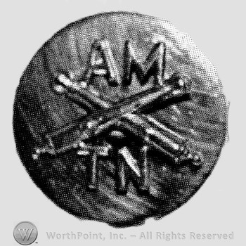 Insignia consisted of crossed cannon and letters AM above and TM below; all on a plate.