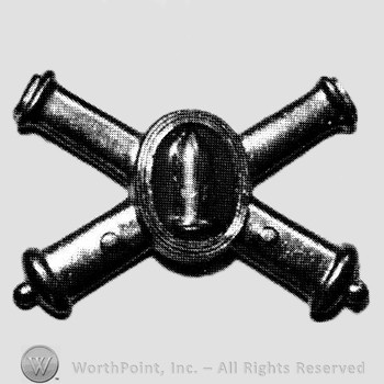 Insignia consisted of crossed cannon with a bullet at the intersection.