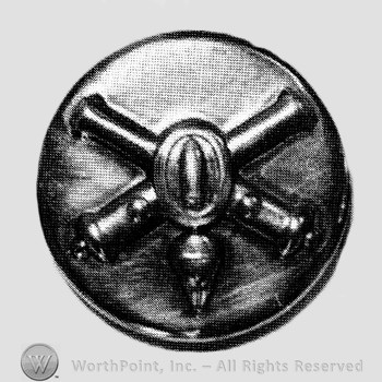 Insignia consisted of crossed cannon with a bullet at the intersection; all on a plate.