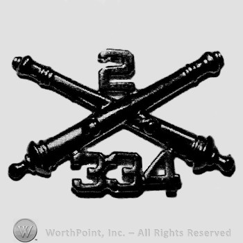 Insignia consisted of crossed cannon with number 2 above and number 334 below.