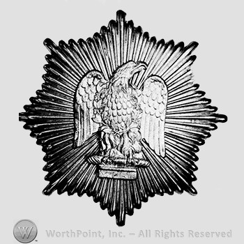 Insignia consisted of a Napoleonic eagle with wreath on its breast, placed on a large sunburst type star.