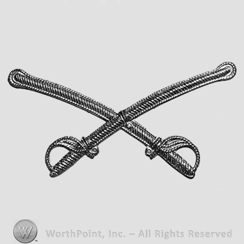 Insignia consisted of crossed swords.