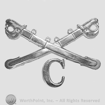 Insignia consisted of crossed sabres and letter C at the intersection.