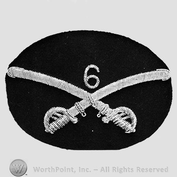 Insignia consisted of crossed swords and number 6 above; embroidered.