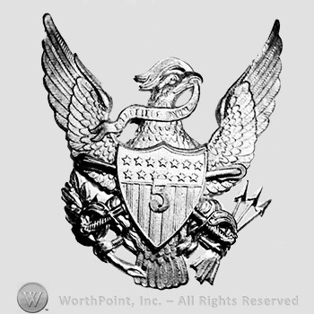 Insignia consisted of an eagle with shield and arrows; number 5 over the shield.