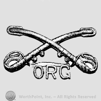 Insignia consisted of crossed sabres and letters ORG below.