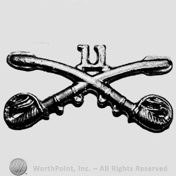 Insignia consisted of crossed sabres and number 11 at the intersection.