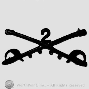 Insignia consisted of crossed sabres and number 2 above.