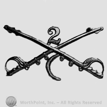 Insignia consisted of crossed sabres and number 2 above and crescent below.
