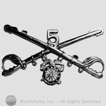 Insignia consisted of crossed sabres and number 5 above and a winged wheel below.