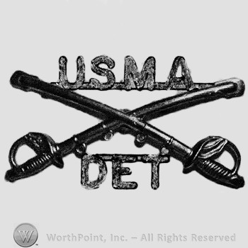 Insignia consisted of crossed sabres and letters USMA above and letters DET below.
