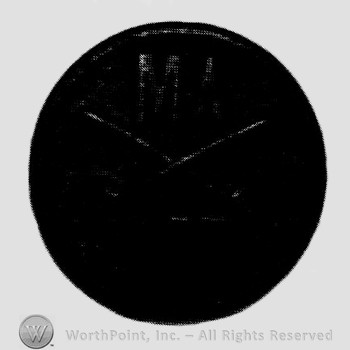 Disc with crossed sabres and letters MA above.