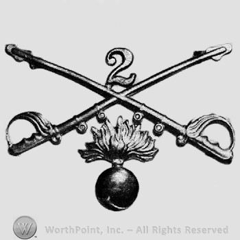 Insignia consisted of crossed sabres and shell with flame below and number 2 above.