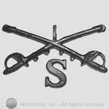 Insignia consisted of crossed sabres and number 1 above and letter S below.