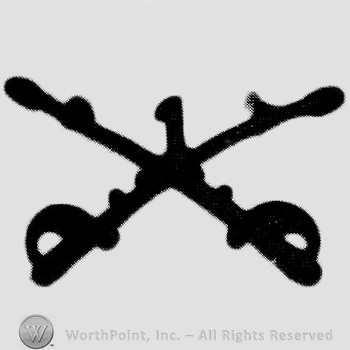 Insignia consisted of crossed sabres and number 1 above.