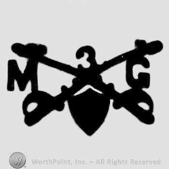 Insignia consisted of crossed sabres, number 3 above, shield below, letter M on the left and letter G on the right.