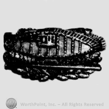 Disc with side view of the Mark VIII Tank above two stylized dragons breathing fire over a wreath.