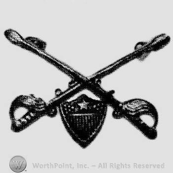 Insignia consisted of crossed sabres and shield below.